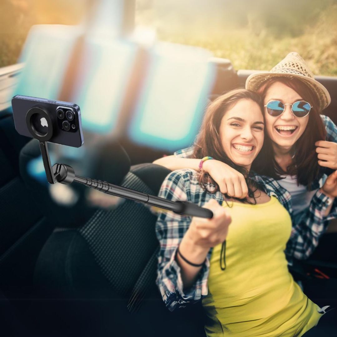 2 women shooting selfie in car