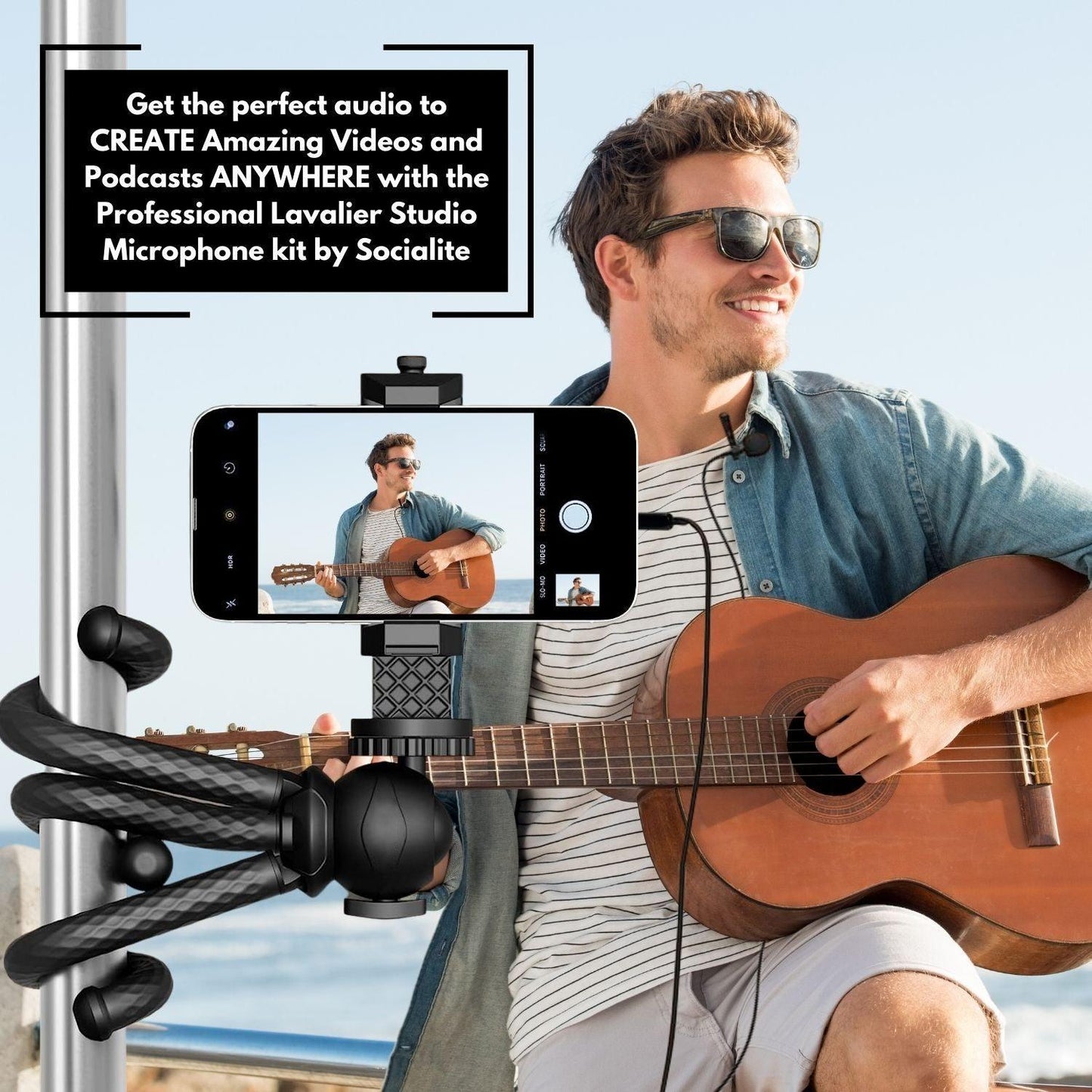 Guitarist man filming and recording his music using socialite lavalier microphone