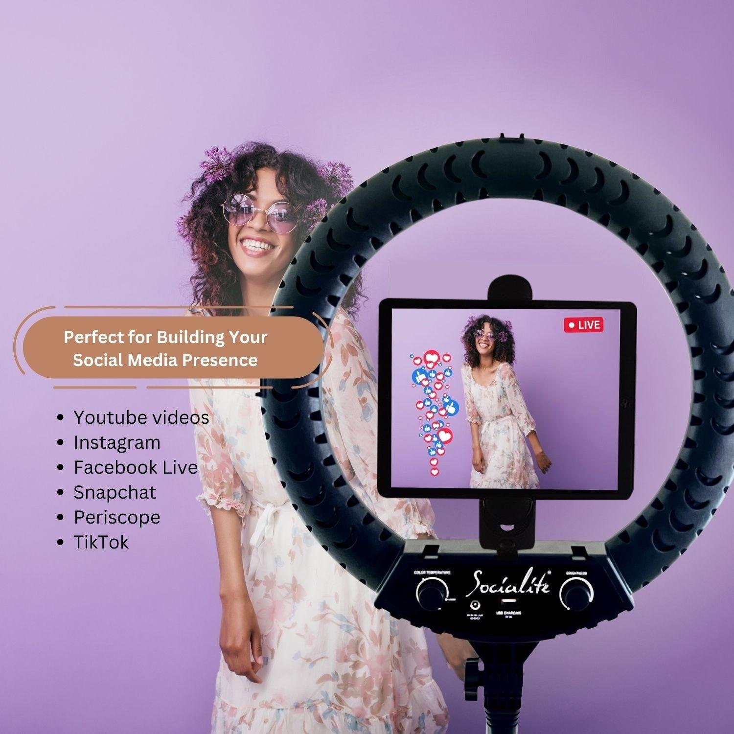 woman live streaming with a ring light