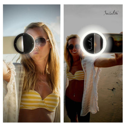 woman taking selfie on beach