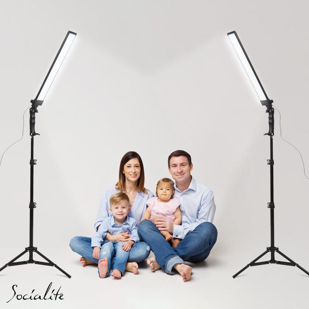 family being photographed with side lighting